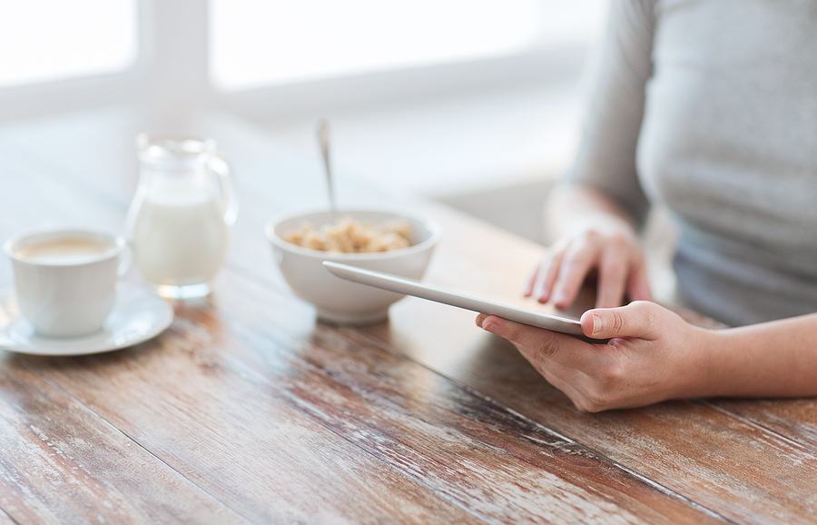 Woman reading on a tablet